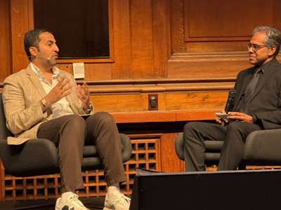 Nadeem Khan moderates at global running discussions in Copenhagen.